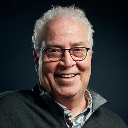 A man wearing glasses.